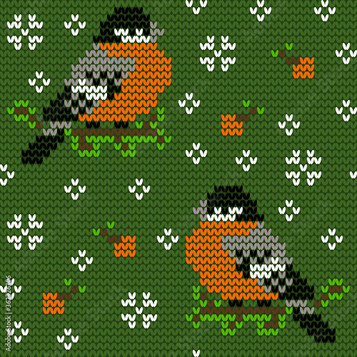 Jacquard knitted seamless pattern with cute bullfinchies, rowanberries and snowflakes. Winter background with nature and birds. Scandinavian style. Vector illustration.