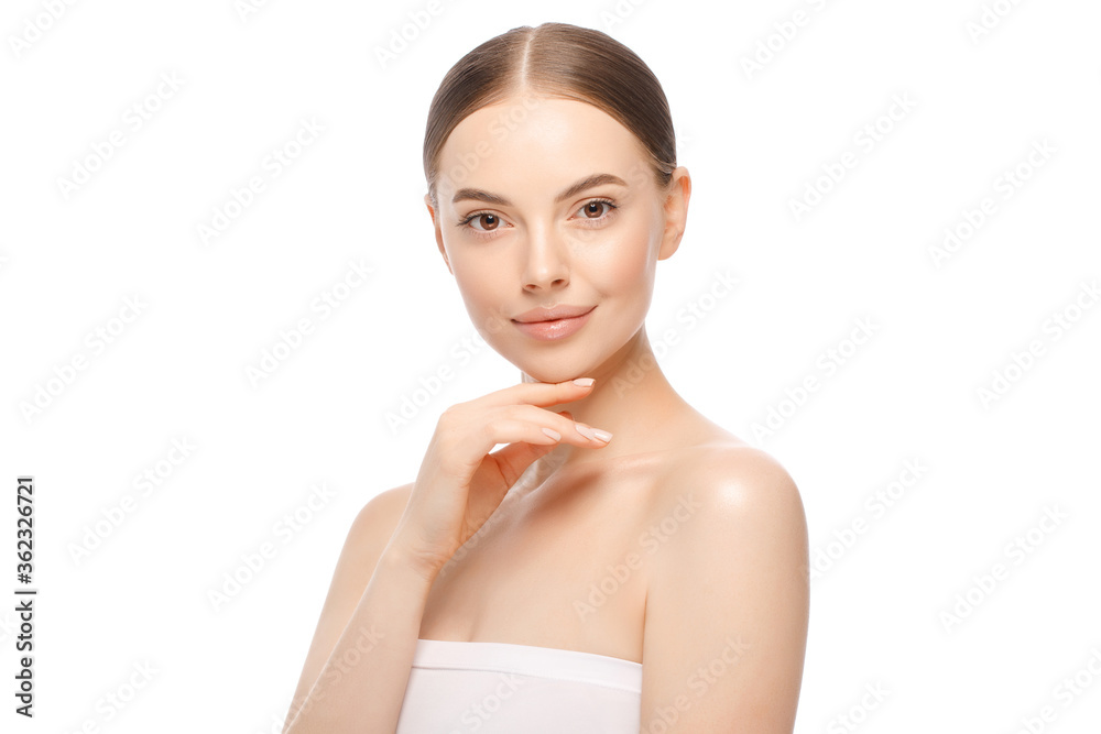Young woman touching her face gently, isolated on white background. Concept of female beauty