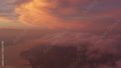 4K RAW Footage in D-log: Aerial view of One World Trade Center above the cloud, WTC 1, New York City Skyline / Cityscape at cloudy day. 