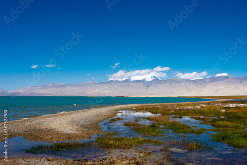 Karakul Lake in Gorno-Badakhshan, Tajikistan. It is located in the World Heritage Site Tajik National Park (Mountains of the Pamirs).