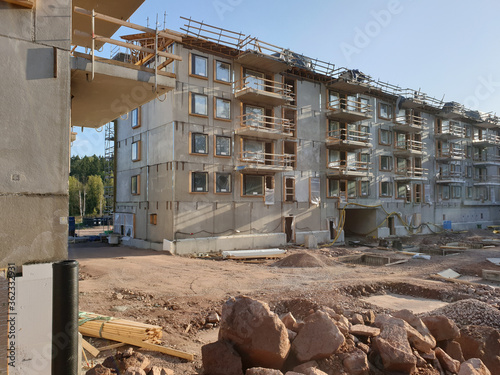 Construction of new residential apartment buildings. Affordable housing, photographed in Puolarmetsä district in Espoo, Finland.