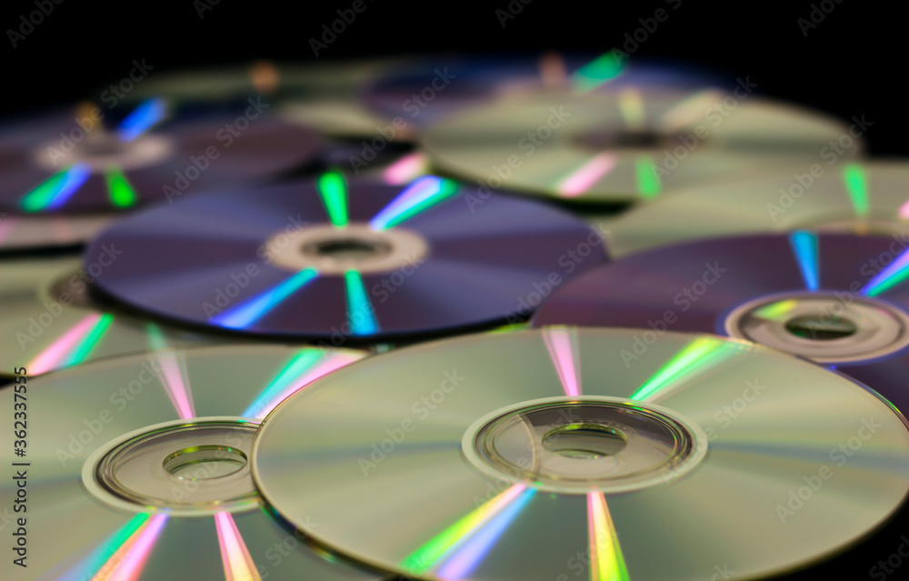 Stack of CDs and Diskettes spread over ground Stack of CDs and Diskettes spread over ground