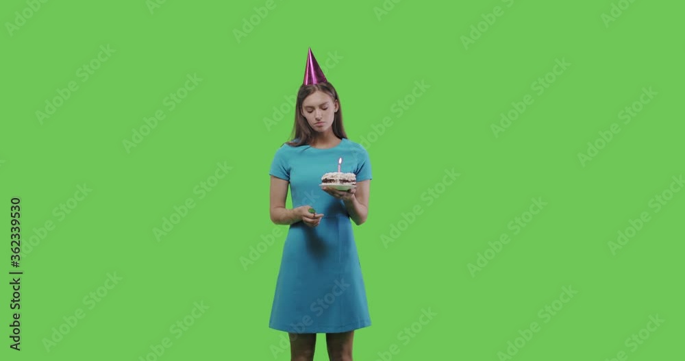 Woman eating piece of cake, birthday celebration Woman eating piece of cake, birthday celebration