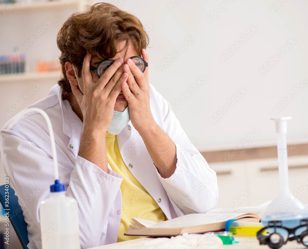 Funny crazy chemist doing experiments and tests Funny crazy chemist doing experiments and tests