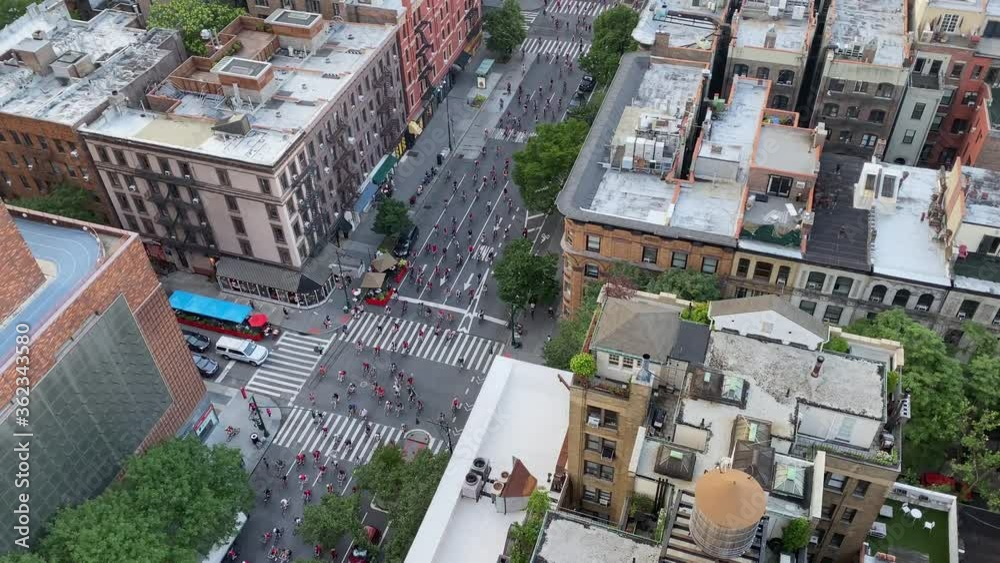Fourth of July Black Lives Matter Bicycle Protest New York City. Hundreds of bicyclists in red shirts protest for freedom chanting shut it down for Defund the Police BLM movement - GREAT AUDIO 