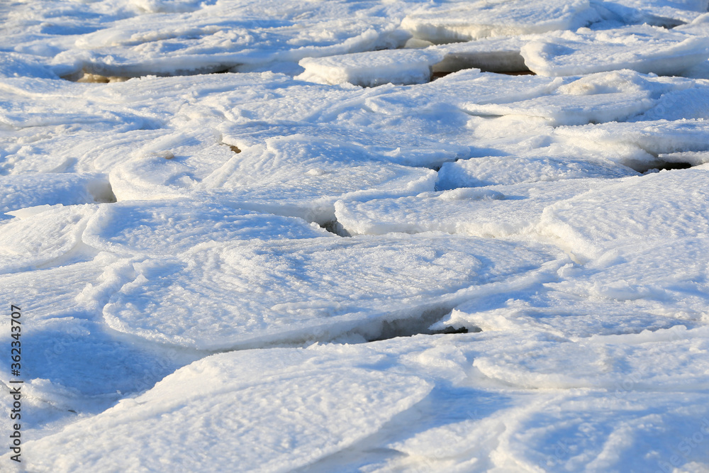 Snow after the sea ice, the seaside in winter