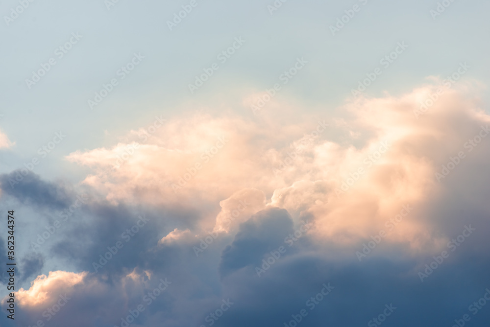 Beautiful rain clouds close-up before sunset. Cumulus clouds close up