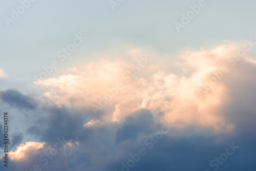 Beautiful rain clouds close-up before sunset. Cumulus clouds close up