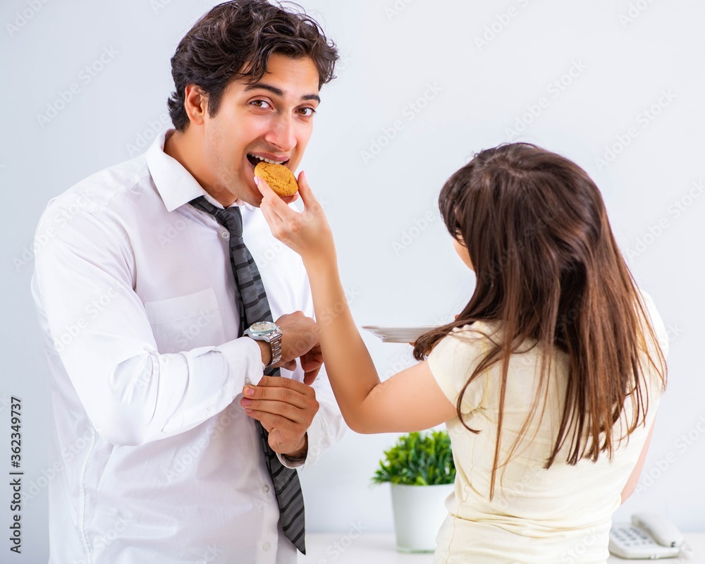 Woman sees her husband off to work Woman sees her husband off to work