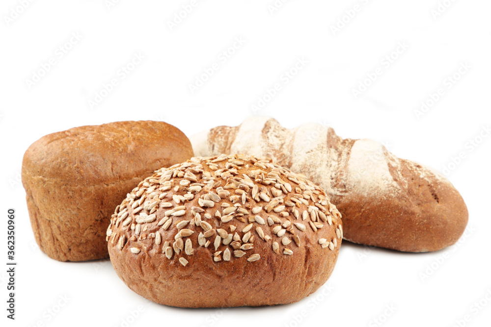 Assortment of different types of bread isolated on a white background