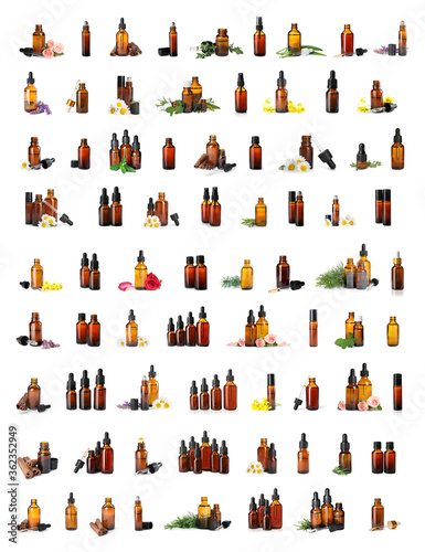 Set with bottles of different essential oils on white background