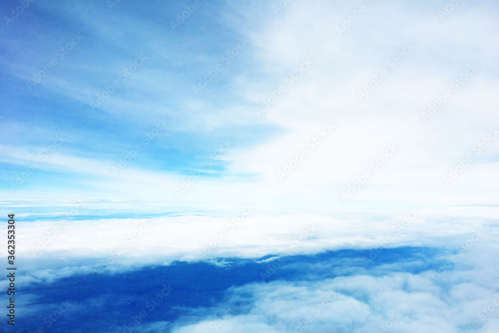 high sky above cloud background is take a photo from window of plane high sky above cloud background is take a photo from window of plane