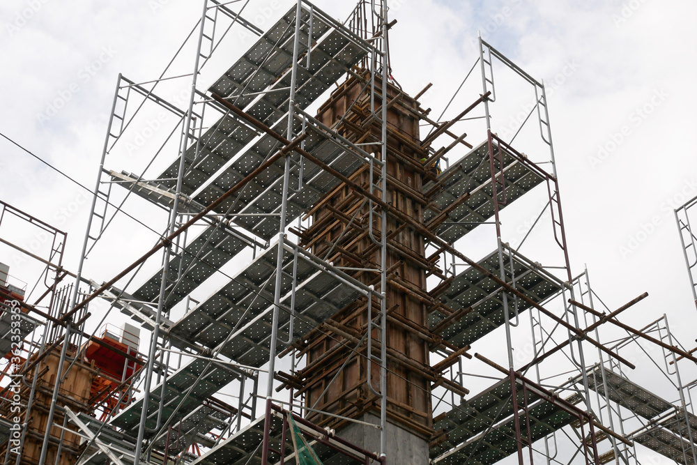 KUALA LUMPUR, MALAYSIA -JULY 29, 2019: Scaffolding is installed on the construction site as temporary support for high level construction. Installed according to specifications to ensure workers safet