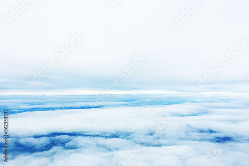 Fototapeta Naklejka Na Ścianę i Meble -  landscape view of sky above cloud in day when travel by plane and look out from window of plane