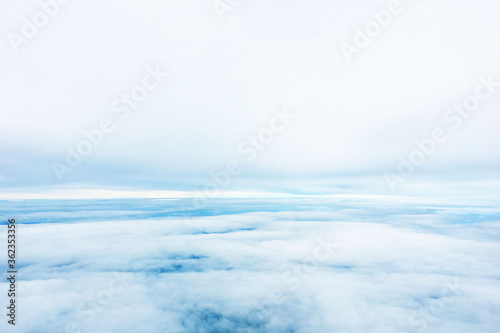 landscape view of sky above cloud in day when travel by plane and look out from window of plane