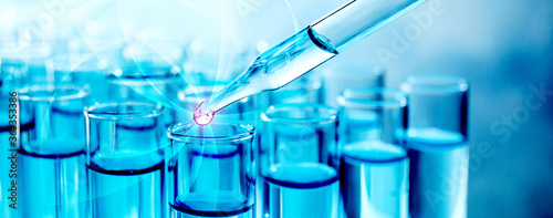Dropping sample into test tube with blue liquid, banner design. Laboratory analysis