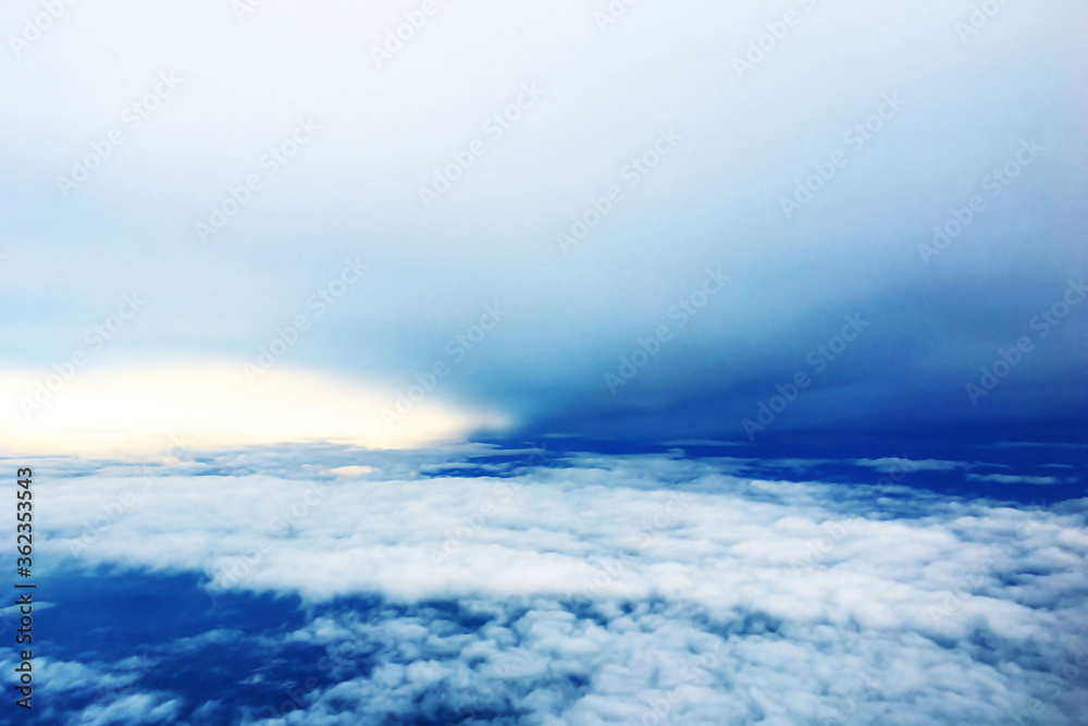beautiful landscape view background of sky above cloud when look from plane's window