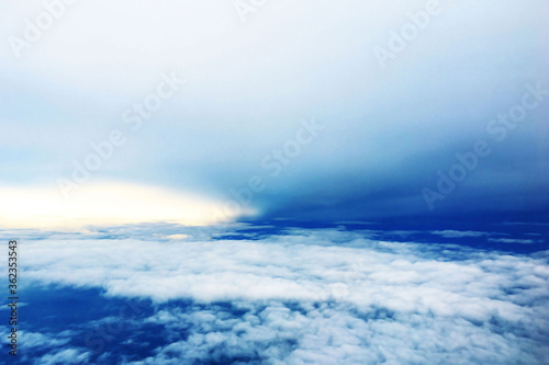 beautiful landscape view background of sky above cloud when look from plane's window © Masteronline2017
