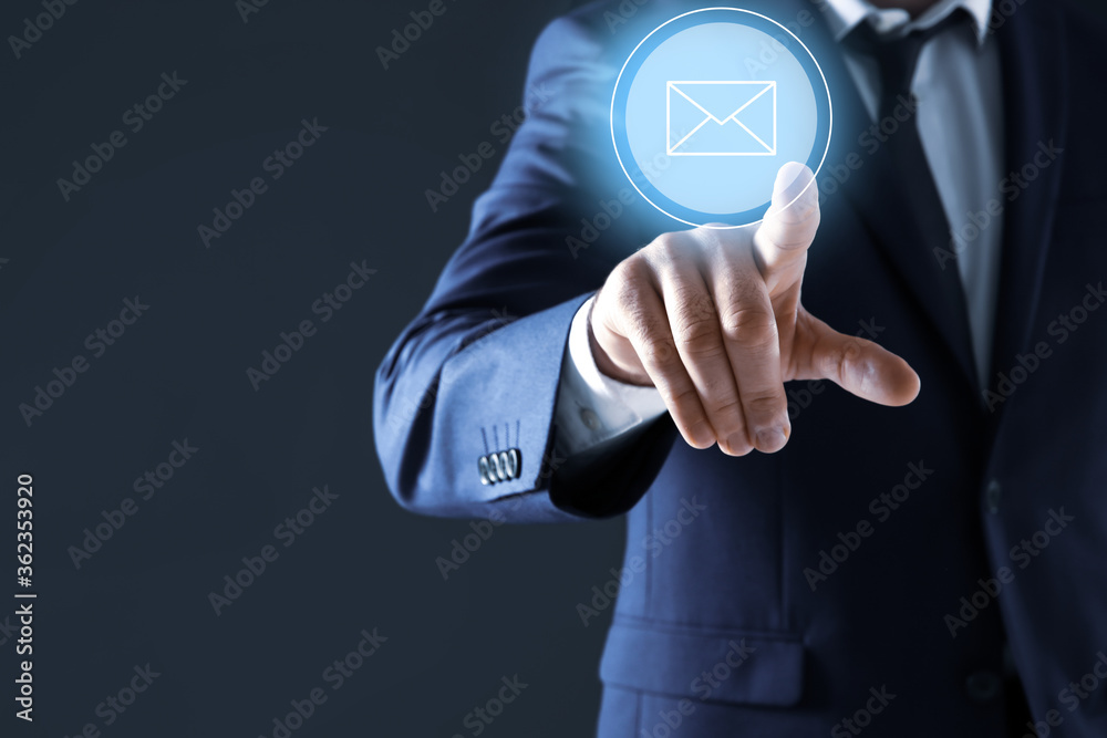Electronic mail. Businessman pointing at virtual image of envelope, closeup Electronic mail. Businessman pointing at virtual image of envelope, closeup