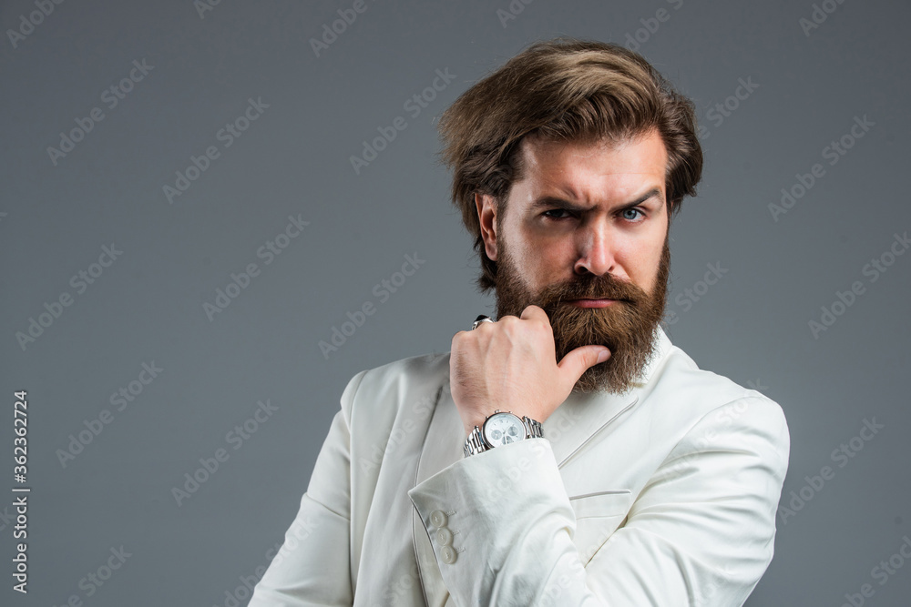 Modern formal style. male beauty and fashion. brutal businessman with perfect beard and moustache. real boss in vest. mature bearded man. confidence and charisma. handsome man wear office suit