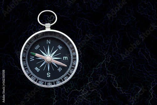 round compass on abstract background as symbol of tourism