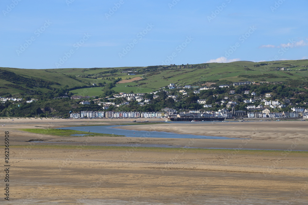 A view of Aberdyfi from across the Dyfi Estuary in Wales, UK. A view of Aberdyfi from across the Dyfi Estuary in Wales, UK.