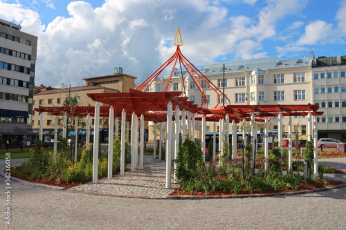 White and red pavilion in the Eastern style in one of the courtyards of the city of Lahti. Finland.