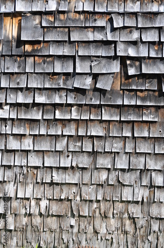 Not So Extremely Weathered Gray Shingles on the Side of a Barn  