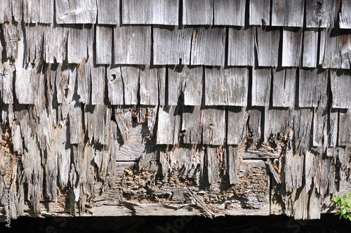 Extremely Weathered Gray Shingles on the Side of a Barn Horizontal