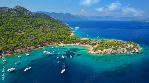 Aerial drone photo of secluded paradise bay and small island of Moni with turquoise crystal clear beach next to Aigina, Saronic gulf, Greece photo