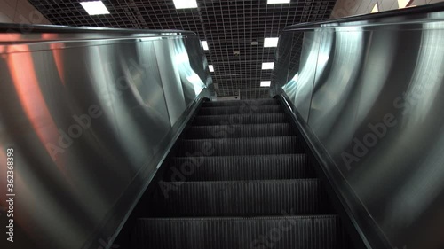 Metro train station escalator in istanbul. steel escalator going up the metro train station. public transport quarantine covid-19. Coronavirus quarantine empty subway escalators