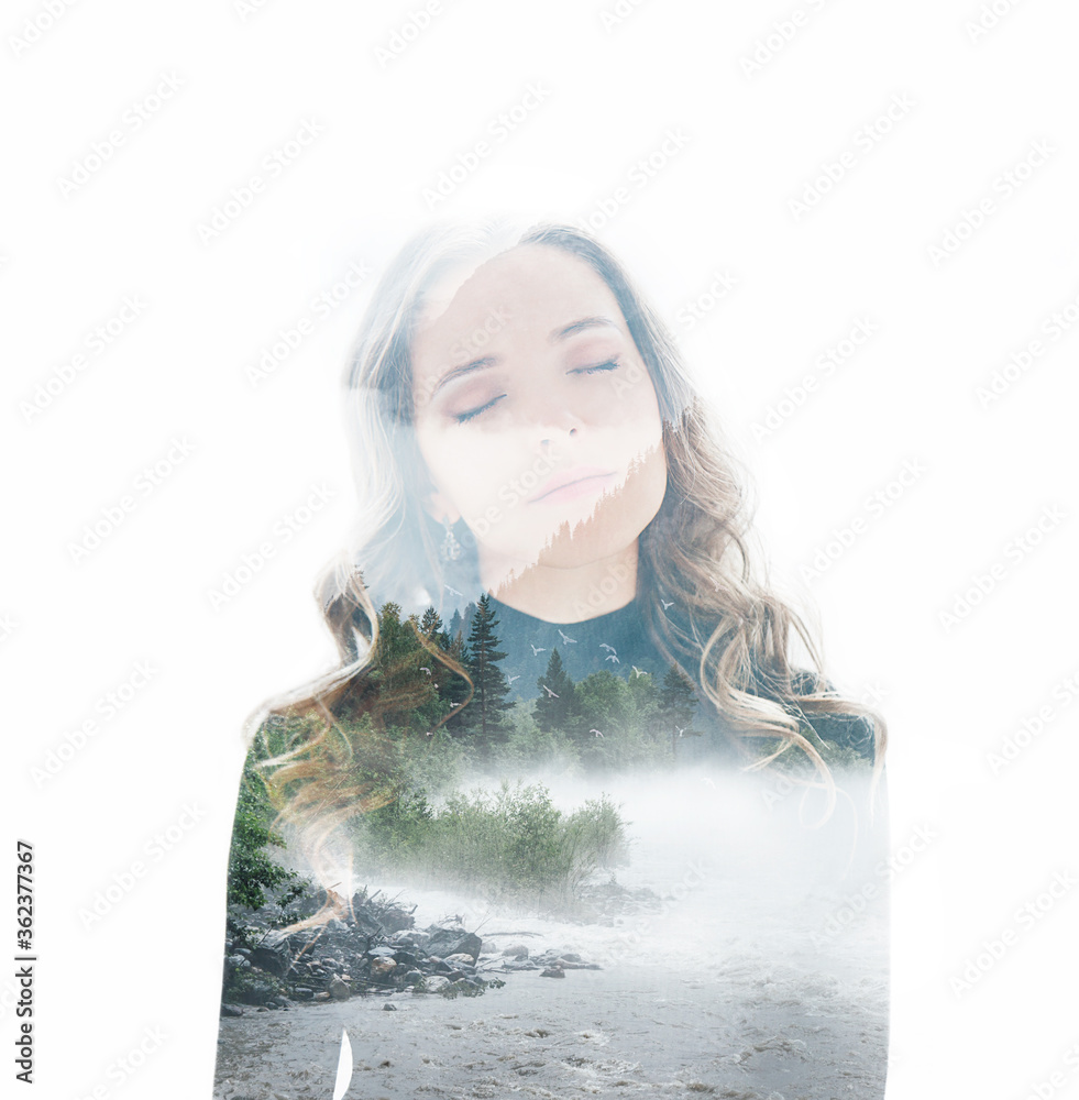 Double exposure portrait of a young dreamy woman combined with ...