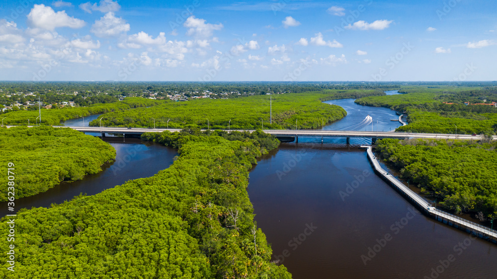Port St. Lucie is a city on the Atlantic coast of southern Florida. The Port St. Lucie Botanical Gardens features areas devoted to orchids, bamboo and native plants, as well as butterflies and humming Port St. Lucie is a city on the Atlantic coast of southern Florida. The Port St. Lucie Botanical Gardens features areas devoted to orchids, bamboo and native plants, as well as butterflies and humming