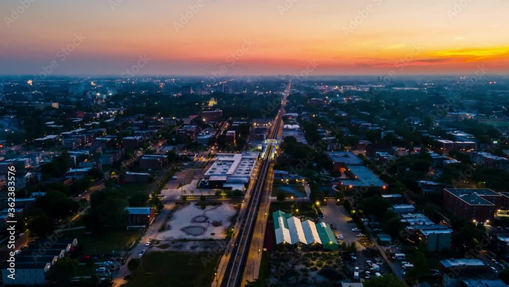 night aerial drone hyper lapse of the city fireworks during 4th of July in Chicago west side neighborhood. Independence day is a festive day that Americans celebration city wide