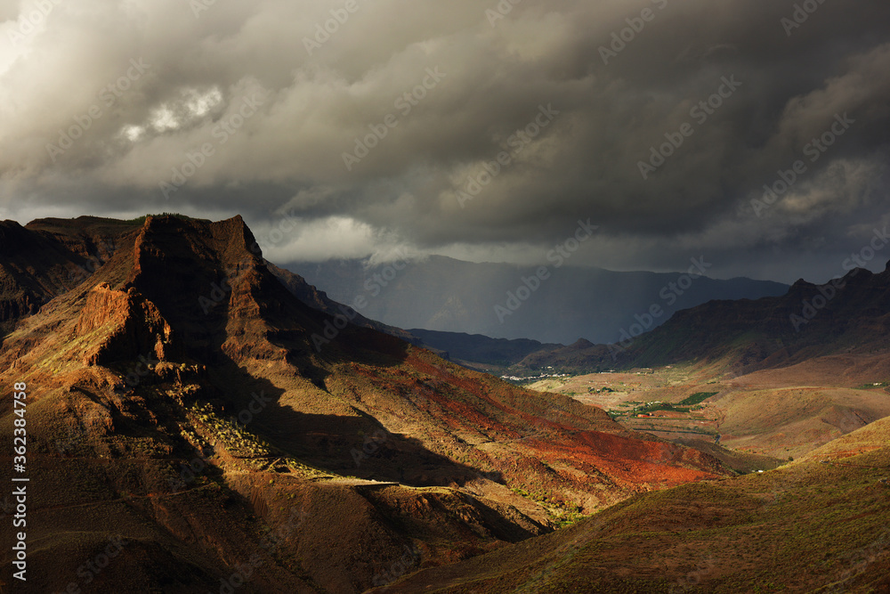 Obraz premium Stormy weather over Natural Park of Pilancones in Gran Canaria, Canary Islands, Spain