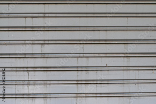 Wallpaper Mural Dirty metal roller shutter door Torontodigital.ca