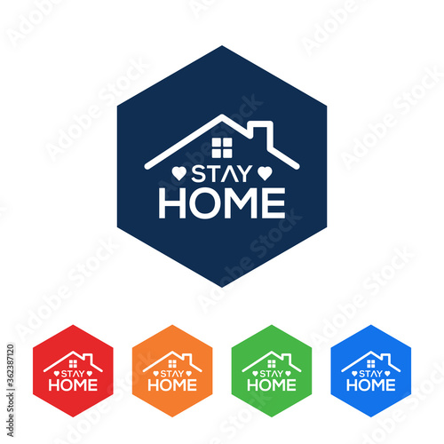 Stay At Home Text Under House Roof.