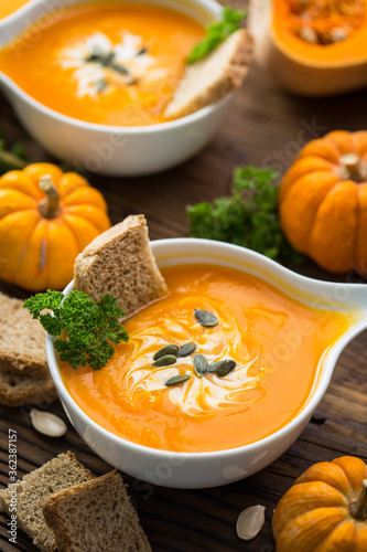 Pumpkin soup with parsley and cream