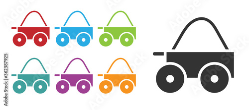 Black Wooden four-wheel cart with hay icon isolated on white background. Set icons colorful. Vector.