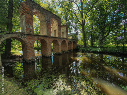 Wide lens view on aqueduct in Arkadia park in Nieborów, Poland