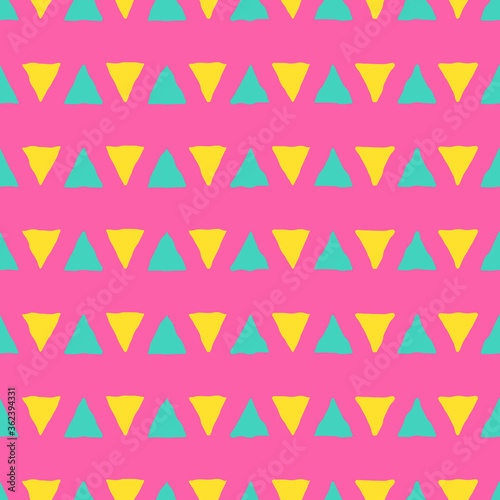 Seamless pattern with yellow and turquoise triangles on a bright pink background. Trendy geometric pattern