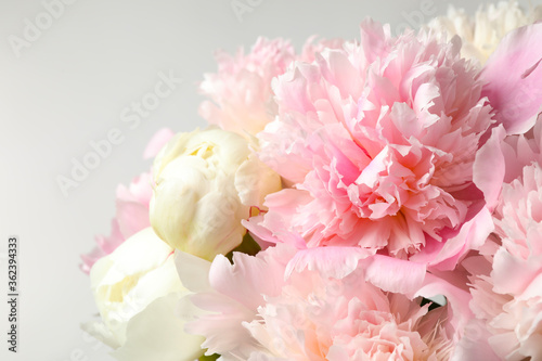 Beautiful peony bouquet on light background  closeup