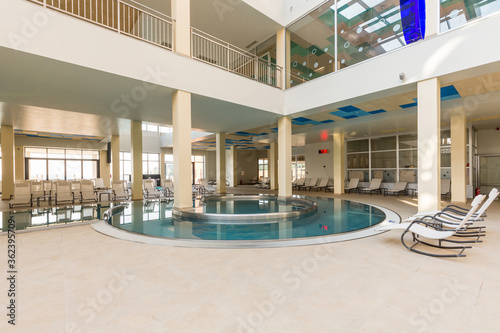 Indoor swimming pool in hotel spa and wellness center