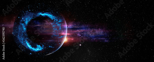 Black hole over star field in outer space, abstract space wallpaper with form of letter O and sparks of light with copy space. Elements of this image furnished by NASA.