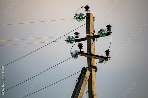Insulators power substations to protect against high load transmission wires.