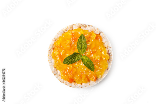 Rice cakes with jam isolated on white background. Rice cakes with orange jam