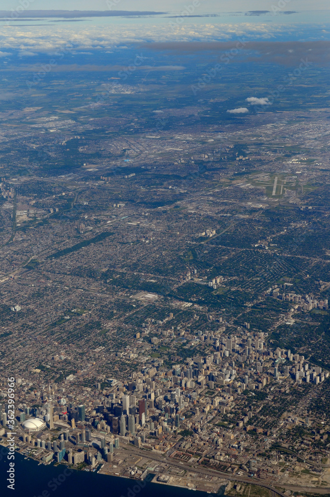 Aerial view of North York and downtown Toronto with highrise towers