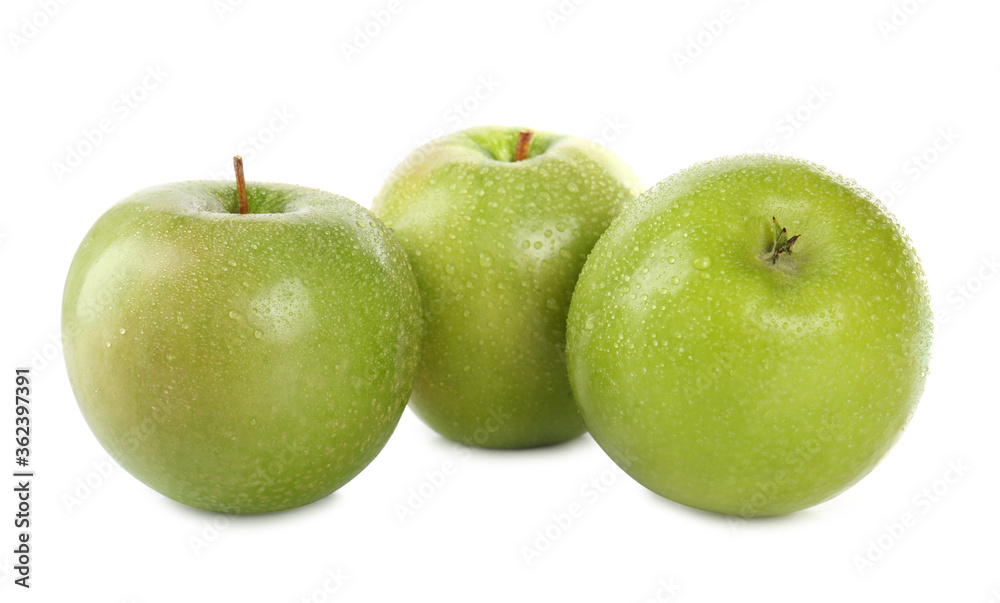 Fresh juicy green apples with water drops isolated on white Fresh juicy green apples with water drops isolated on white