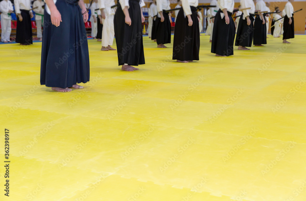People in kimono on martial arts weapon training seminar People in kimono on martial arts weapon training seminar