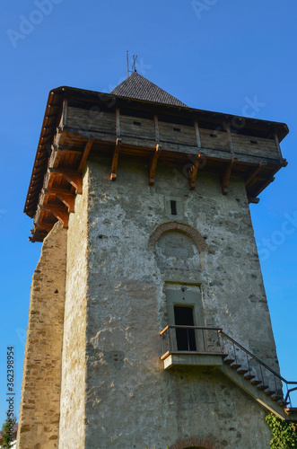 Obraz na płótnie HUMORULUI MONASTERY, BUCOVINA, ROMANIA, EUROPE, SPRING 2018. Medieval stone and wood tower of the Orthodox Humor Monastery. w salonie